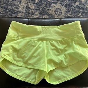 Lulu lemon highlighter running shorts.